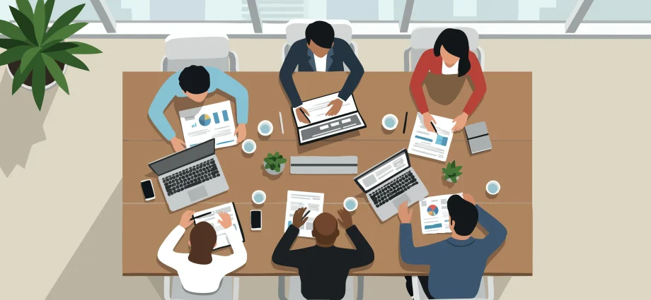 97586180 Business Team Meeting Collaboration with Laptop and Documents in Office Environment (1)